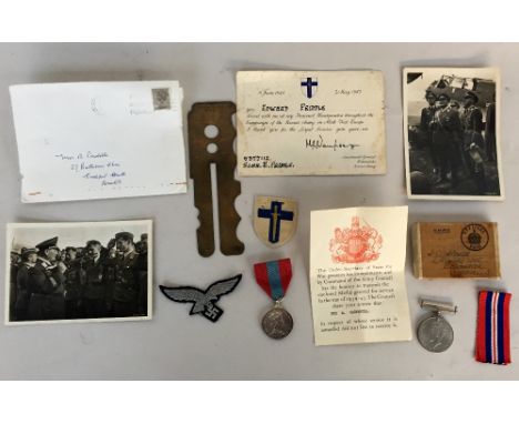 WWII Luftwaffe cloth cap badge;two black and white postcards "Reichsmarshall Göring an der Front"; Elizabeth II Faithful Serv