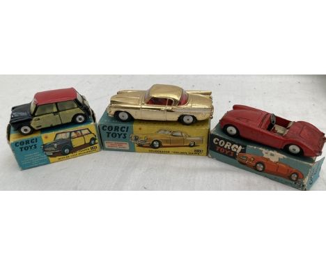 Corgi: A collection of three boxed Corgi Toys vehicles to include: Studebaker Golden Hawk, 211S, good condition, some playwea