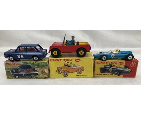 Dinky: A collection of three boxed Dinky Toys to comprise: Cooper Racing Car 240, good condition with fair box, Land Rover 34