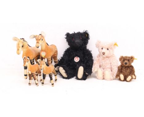 Steiff: A collection of four Steiff Giraffe 'Okapi'; together with three yellow tag Steiff bears to comprise: 029615, 003509 