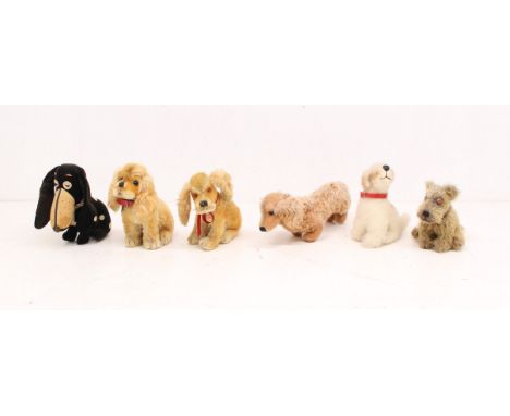 Plush: A collection of six plush dogs to include: Steiff dachshund with button in ear, Steiff Revue Susi, Dean's Nif, and thr