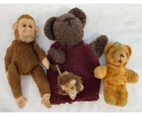 Bears: An unmarked monkey with jointed limbs 22cm; a teddy bear hand puppet; small jointed bear 13cm; and a small lion with j