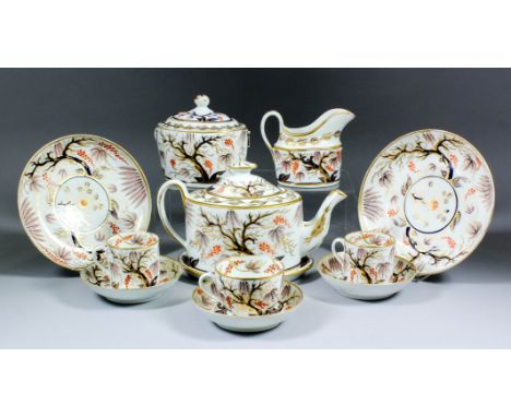 An early 19th Century English porcelain part tea and coffee service decorated in the "Imari" manner (pattern No. 446), compri