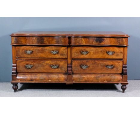 A Victorian "North Country" figured mahogany chiffonier sideboard by Wilkinson, with shaped and moulded edge to top, fitted t