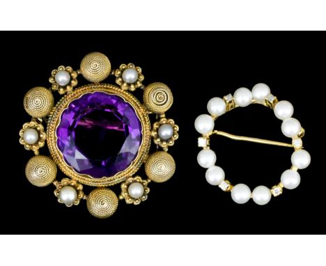 A late Victorian gold coloured metal mounted amethyst and seed pearl set brooch, the circular cut amethyst, 18mm in diameter,