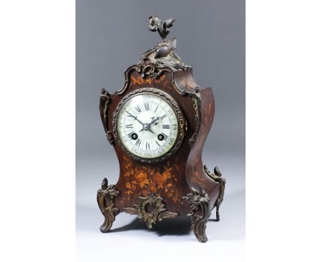 A late 19th Century French rosewood marquetry and gilt brass mounted mantel clock of "Louis XV" design, by A.D. Mougin, No. 4