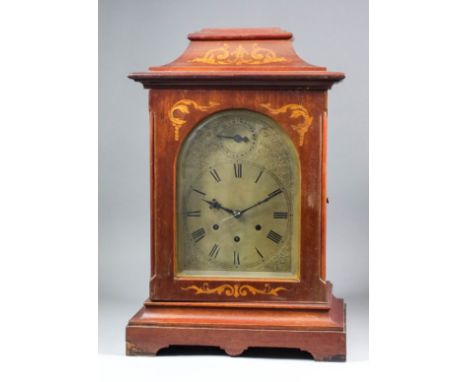 A late 19th Century German mahogany cased mantel clock by Gustav Becker, No. 2062048, the arched silvered dial with Roman num