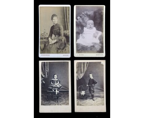 SCRAP ALBUM. An album containing mounted chromolithographed 'scraps' and greetings cards, collected by a child named 'Bessie'