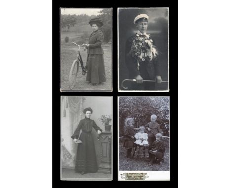 PHOTOGRAPHS. Two albums containing approximately 116 cabinet-size and cartes-de-visite portrait photographs, including family