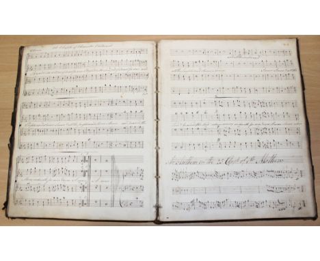 MANUSCRIPT MUSIC. A leather-bound album of manuscript music inscribed 'Rob't Frost His Book, June 22, 1814', leaves approx 28