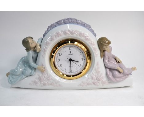 A Lladro 'Two Sisters' mantel clock, 16.5 cm highGood condition -&nbsp;no chips or cracks