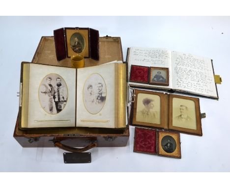 The remaining collection of items belonging to Annie Macdonald, including an album of Royal Family portrait photographs, two 