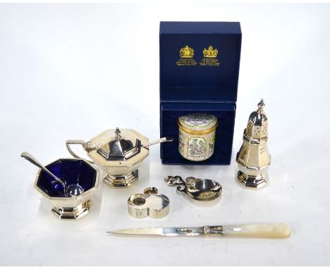 A silver three-piece condiment set of octagonal form, with blue glass liners, Mappin &amp; Webb, Sheffield 1947 and a caddy s