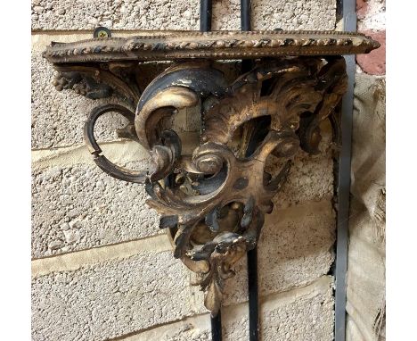 An antique Italianate rococo style wall bracket, giltwood and composite, 33 cm x 33 cm h