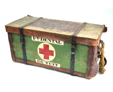 A vintage army 'Field dentistry' trunk, wicker and canvas reinforced with tan leather, with Fd. Dental Outfit and red cross t