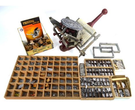 An Adana of London model no 2 HS cast iron printing press to/w a quantity of metal print block lettering etc