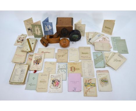 An interesting selection of late Victorian and Edwardian dance cards, to/w two miniature carpenter's planes, a japanned tin m