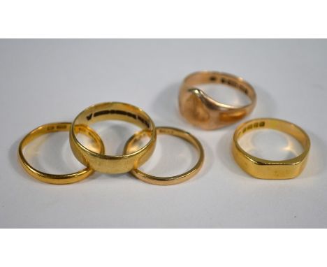 Five various yellow gold rings - an 18ct narrow signet ring, size Q, &nbsp;5.4g; a 22ct narrow wedding band, size S but disto