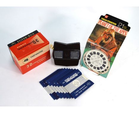 A Viewmaster 3-D viewer Model E, boxed, c/w a 'Planet of the Apes' disc in unopened packet and other discs, to/w three Tri-an