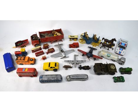 A collection of vintage model aeroplanes and vehicles - US and British, including Kiddie-Toy (two fighter planes), Tootsie-To