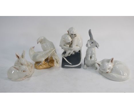 Two Royal Copenhagen models - Three white rabbits, no. 2539 and a Sleeping white cat, no. 422 to/w a porcelain model of a rab