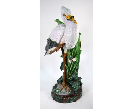 A Joseph Holcroft 19th century majolica stick stand in the form of a heron, 80 cm highBroken sections to the back - all piece