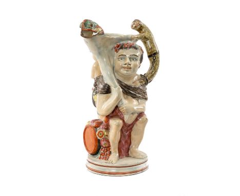EARLY 19TH C. PEARLWARE BACCHUS & SATYR TOBY JUG, modelled with Bacchus seated on a barrel laden with fruit, holding cornucop