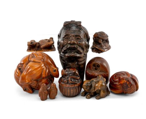 ASSORTED JAPANESE MINIATURE WOOD CARVINGS including various 20th C. netsuke, two Chinese carved peach stones and a Japanese h