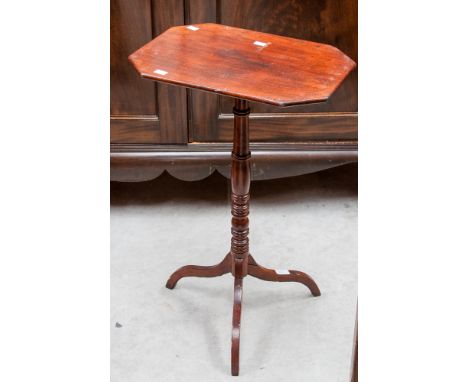 An early 19th century mahogany tripod table