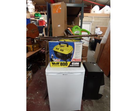 A quantity of items including a Hotpoint 'Iced Diamond' freezer and a collection of garden tools, including grass trimmer, po