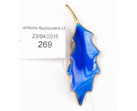 Karl Rasmussen, a Norwegian silver gilt and blue enamel leaf brooch