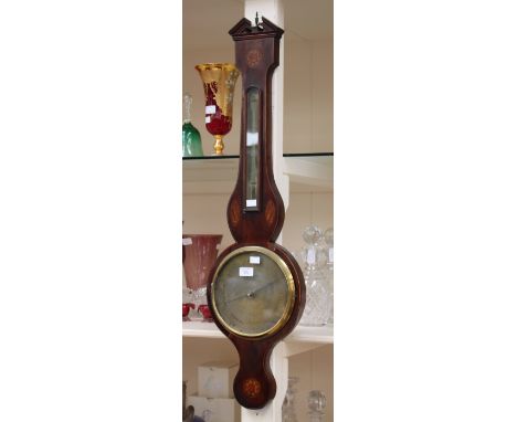 A late George III barometer inscribed 'A Cattanio, Worcester' with brass dial, 96 cm length approx 