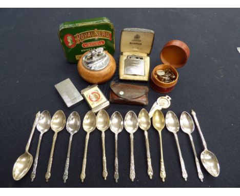 Cigarette lighters, tobacco tin (Royal seal) EPNS apostle spoons, leather stud box of cufflinks, etc 