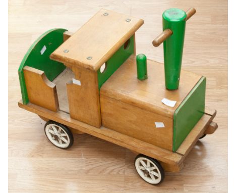 A circa 1960s gault wooden sit on train engine 