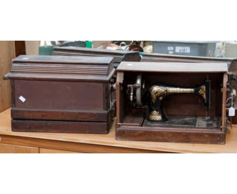 Two cased Singer sewing machines (2) with tools 