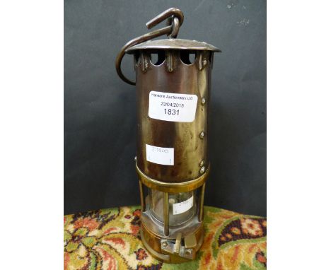 A miners lamp by The Protector Lamp of Lighting Co Ltd, Eccles, type SL, approval No B/120 (1) 