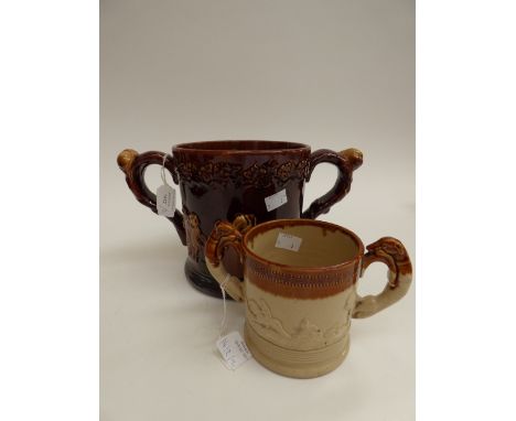 **REOFFER IN MAY £40 - £60** An unusual Treacle glazed large Staffordshire late 18th early 19th Century 'Loving Cup' applied 
