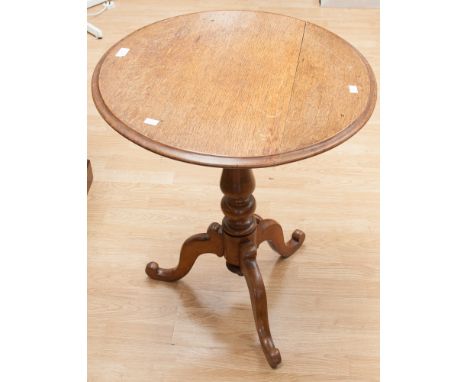 A mid 19th century oak and fruitwood tilt-top tripod table