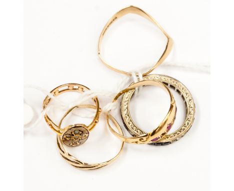 A Victorian gold ring, having oval mount with crucifix in seed pearls with black enamel details and four other 9ct rings