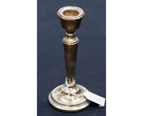 A silver candlestick of classical form, hallmarked for Birmingham, 15 cm high approx 