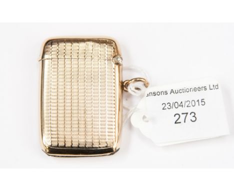 A 9ct yellow gold rectangular Vesta case, engine turned with circular vacant cartouche, 18.5g