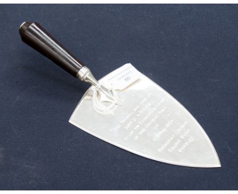 A Garrard and Co silver presentation trowel on a turned wooden handle, engraved with inscription for laying foundation stone 