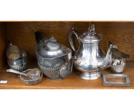 A three piece tea service EPBM, silver plated teapot, silver frame, EPNS napkin ring and pierced dish and two spoons (9) 