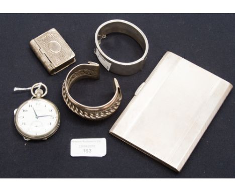 A hallmarked silver cigarette case, with a silver bangle, weighing in total 7.32 ozt approx, along with an African silver whi