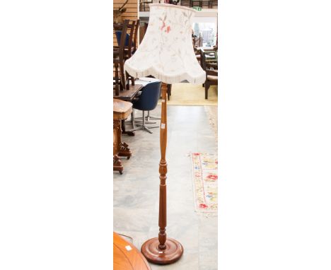 A mahogany standard lamp 