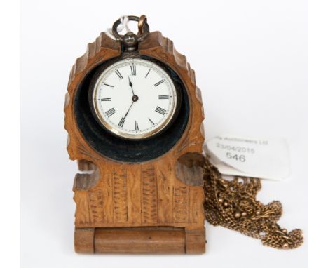 A carved early 19th Century boxwood watchcase with intricate tooled design; a late 19th Century silver ladies pocket watch (S