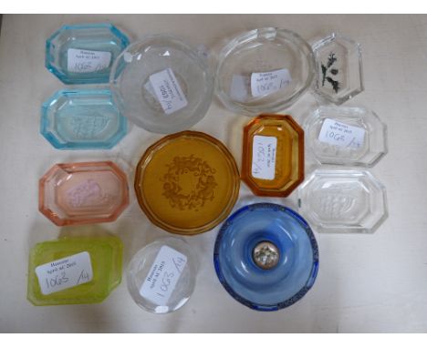 A collection of 14 intaglio glass trinket dishes