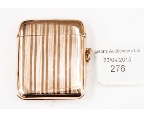 A gilt rose gold square vesta case, engine turned with cartouche engraved initials 'G.C'