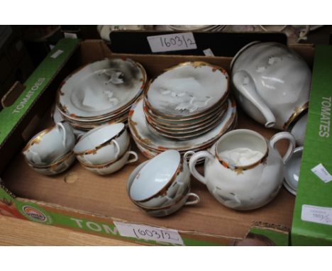 A Japanese eggshell tea service and a Victorian teaset