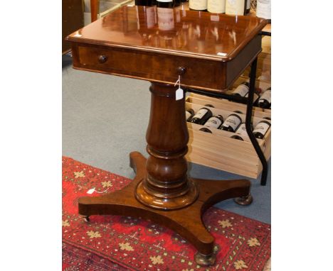 An early Victorian mahogany pedestal side table, circa 1840, fitted with a single drawer & a brushing slide to side, raised o